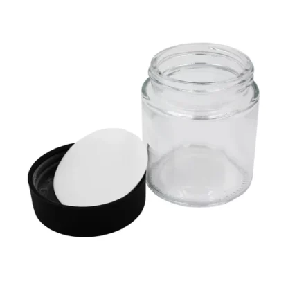 4ozclearglassjarwcrcap_peliner_capflatonsidewlinerout_astm_500x 4ozclearglassjarwcrcap_peliner_capflatonsidewlinerout_astm_500x